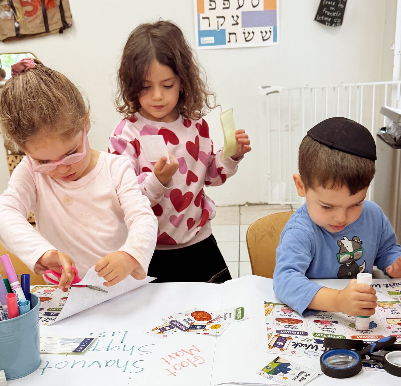 Children creating together at PJECC